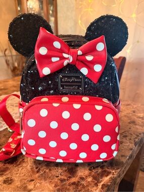 Loungefly Black Sequin Minnie Ears Backpack with Red Polka Dot Bow